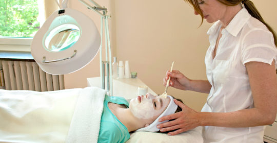 dermatologist or PA applying a chemical peel